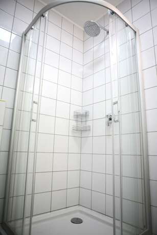Imagen de la habitación del Hotel City Express Hostel. Foto 14