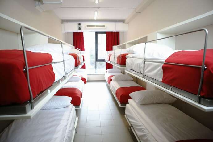 Imagen de la habitación del Hotel City Express Hostel. Foto 15
