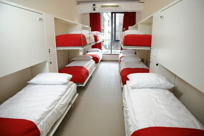 Imagen de la habitación del Hotel City Express Hostel. Foto 17