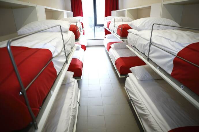 Imagen de la habitación del Hotel City Express Hostel. Foto 18