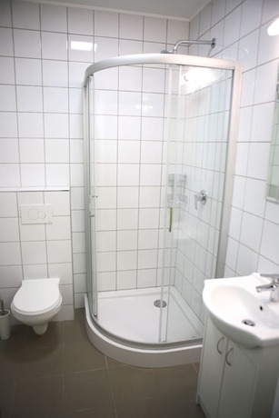 Imagen de la habitación del Hotel City Express Hostel. Foto 19