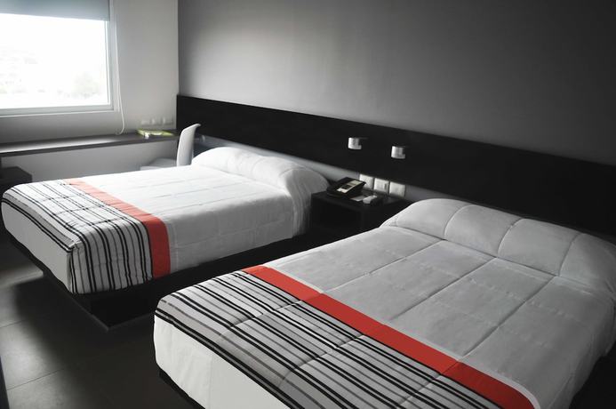 Imagen de la habitación del Hotel City Express Junior Aguascalientes Centro. Foto 9