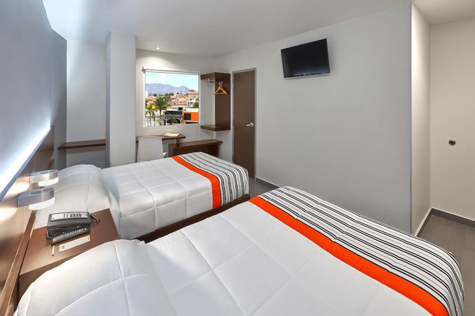 Imagen de la habitación del Hotel City Express Junior Aguascalientes Centro. Foto 10