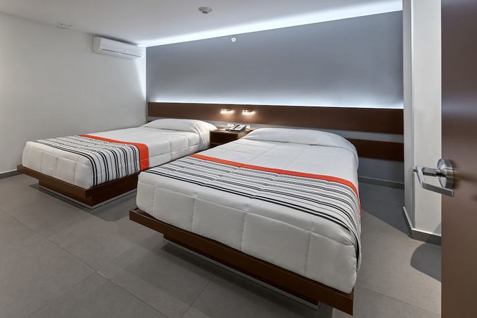 Imagen de la habitación del Hotel City Express Junior Aguascalientes Centro. Foto 11