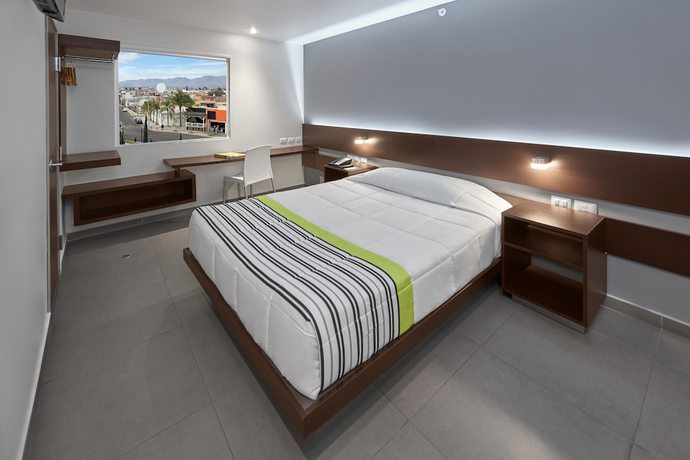 Imagen de la habitación del Hotel City Express Junior Aguascalientes Centro. Foto 14