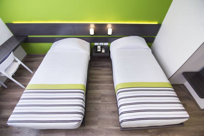 Imagen de la habitación del Hotel City Express Junior Bogota Aeropuerto. Foto 8