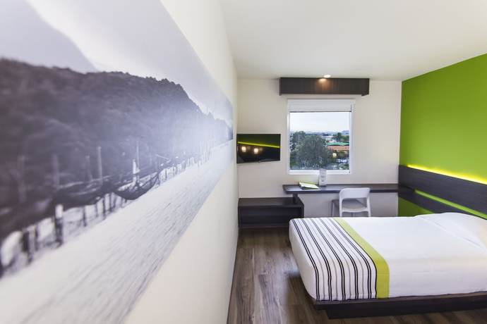 Imagen de la habitación del Hotel City Express Junior Bogota Aeropuerto. Foto 9