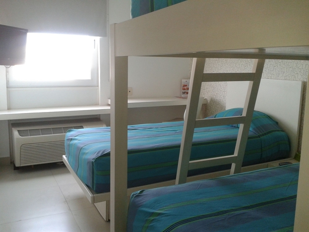 Imagen de la habitación del Hotel City Express Junior By Marriott Cancun. Foto 5