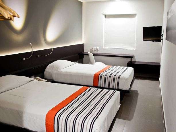 Imagen de la habitación del Hotel City Express Junior By Marriott Ciudad Del Carmen Aeropuerto. Foto 10