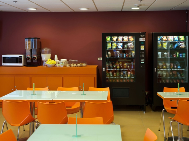 Imagen del bar/restaurante del Hotel City Express Junior By Marriott Ciudad Juarez Consulado. Foto 4