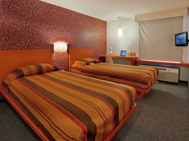 Imagen de la habitación del Hotel City Express Junior By Marriott Guadalajara Periférico Sur. Foto 7