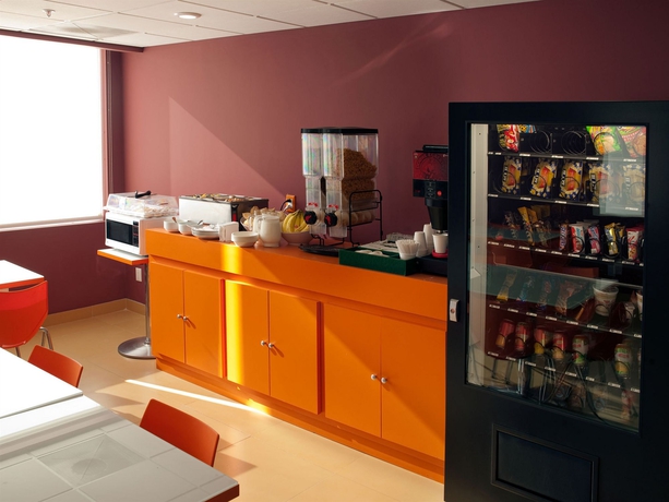 Imagen del bar/restaurante del Hotel City Express Junior By Marriott Guadalajara Periférico Sur. Foto 4