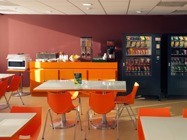 Imagen del bar/restaurante del Hotel City Express Junior By Marriott Guadalajara Periférico Sur. Foto 5