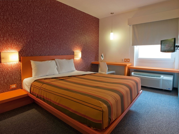 Imagen de la habitación del Hotel City Express Junior By Marriott Guadalajara Periférico Sur. Foto 10