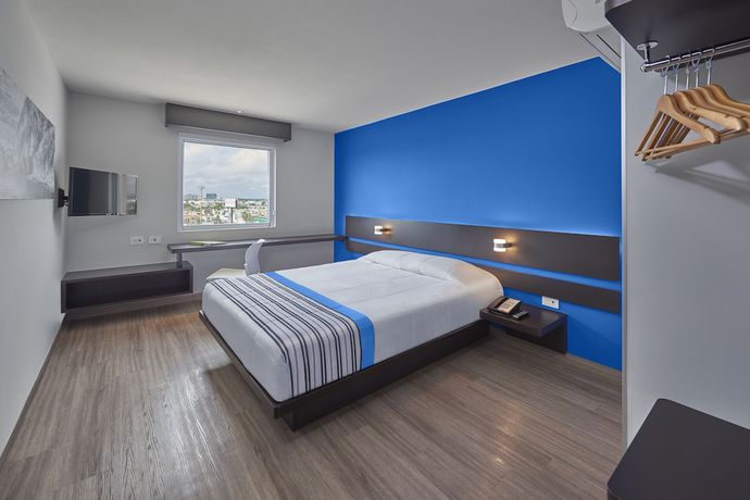 Imagen de la habitación del Hotel City Express Junior By Marriott Merida Altabrisa. Foto 7