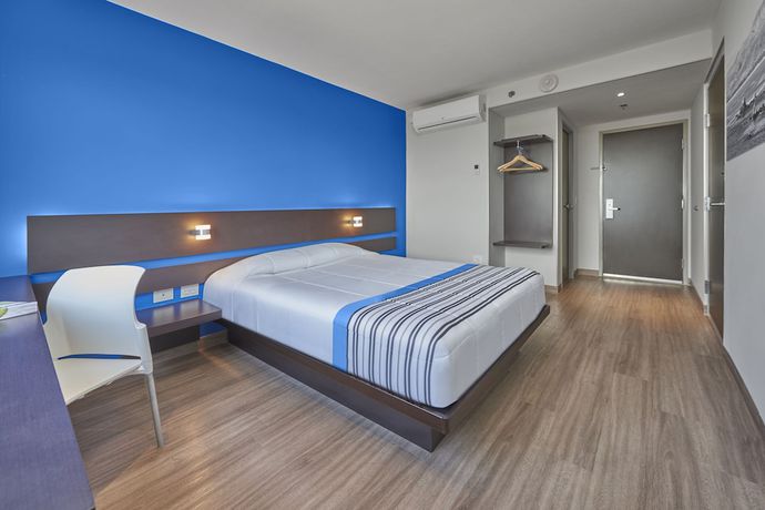 Imagen de la habitación del Hotel City Express Junior By Marriott Merida Altabrisa. Foto 8