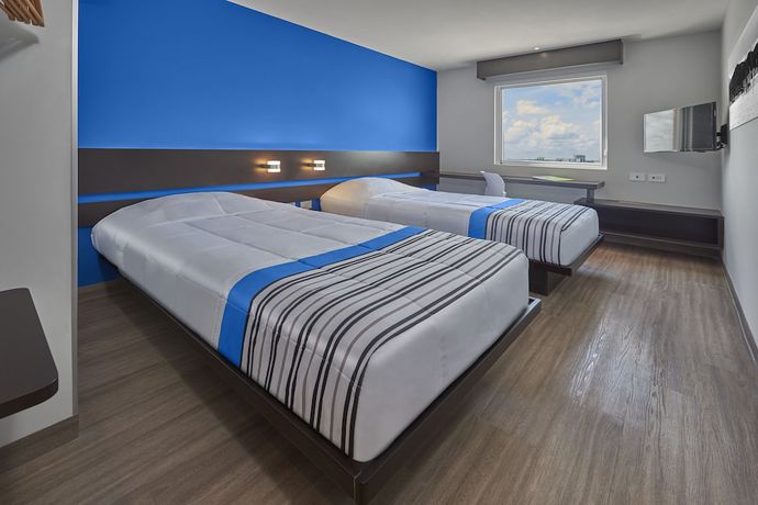 Imagen de la habitación del Hotel City Express Junior By Marriott Merida Altabrisa. Foto 10