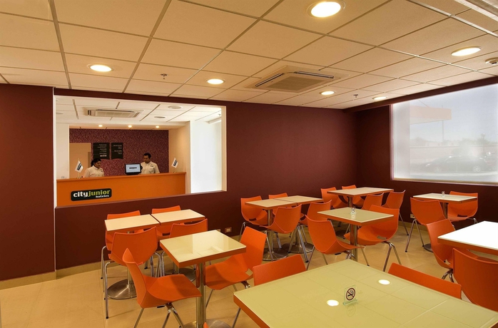 Imagen del bar/restaurante del Hotel City Express Junior By Marriott Mexicali. Foto 4
