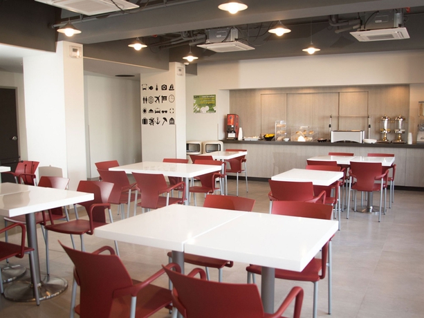 Imagen del bar/restaurante del Hotel City Express Junior By Marriott Puebla Finsa. Foto 3