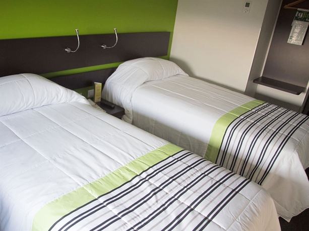 Imagen de la habitación del Hotel City Express Junior By Marriott Puebla Finsa. Foto 5