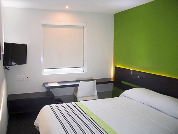 Imagen de la habitación del Hotel City Express Junior By Marriott Puebla Finsa. Foto 8