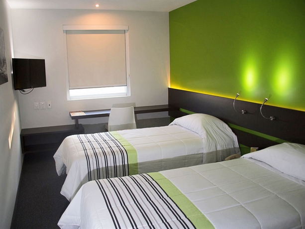 Imagen de la habitación del Hotel City Express Junior By Marriott Puebla Finsa. Foto 9