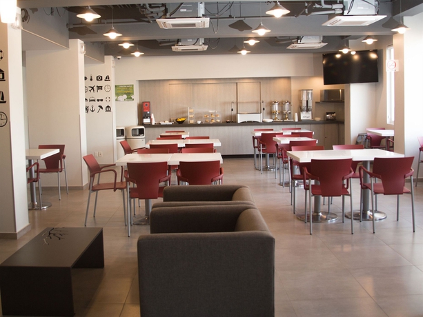 Imagen del bar/restaurante del Hotel City Express Junior By Marriott Puebla Finsa. Foto 4