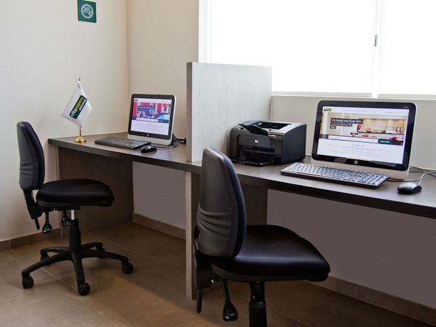 Imagen del bar/restaurante del Hotel City Express Junior By Marriott San Luis Potosi Carranza. Foto 2