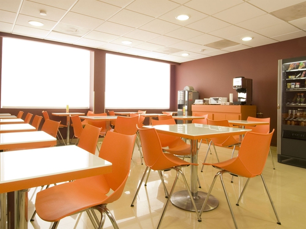 Imagen del bar/restaurante del Hotel City Express Junior By Marriott Toluca Aeropuerto. Foto 6