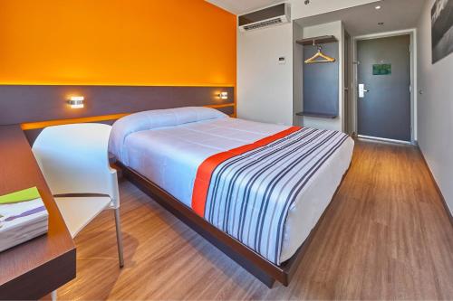 Imagen de la habitación del Hotel City Express Junior By Marriott Tuxtepec. Foto 9