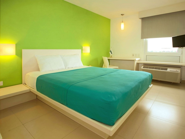 Imagen de la habitación del Hotel City Express Junior By Marriott Veracruz Aeropuerto. Foto 9