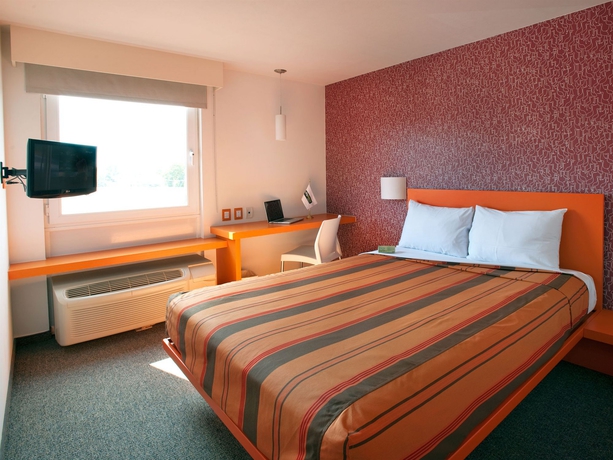 Imagen de la habitación del Hotel City Express Junior Tuxtla Gutiérrez Poliforum. Foto 9