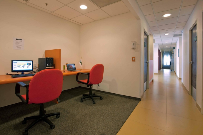 Imagen de los interiores del Hotel City Express Junior Tuxtla Gutiérrez Poliforum. Foto 13