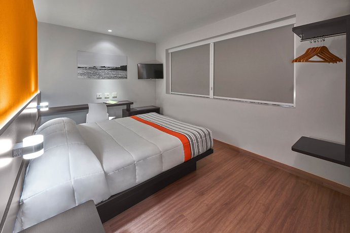 Imagen de la habitación del Hotel City Express Junior by Marriott CDMX Sullivan. Foto 12