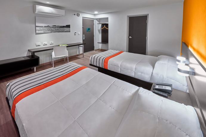 Imagen de la habitación del Hotel City Express Junior by Marriott CDMX Sullivan. Foto 15