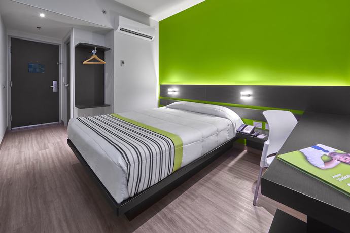 Imagen de la habitación del Hotel City Express Junior by Marriott Puebla Angelopolis. Foto 10