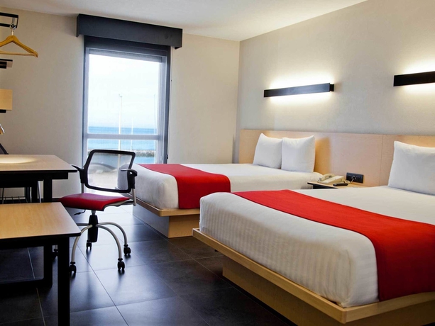 Imagen de la habitación del Hotel City Express La Paz. Foto 6