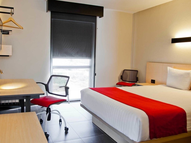 Imagen de la habitación del Hotel City Express La Paz. Foto 9