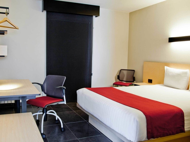 Imagen de la habitación del Hotel City Express La Paz. Foto 10