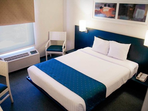 Imagen de la habitación del Hotel City Express Monterrey Aeropuerto. Foto 4