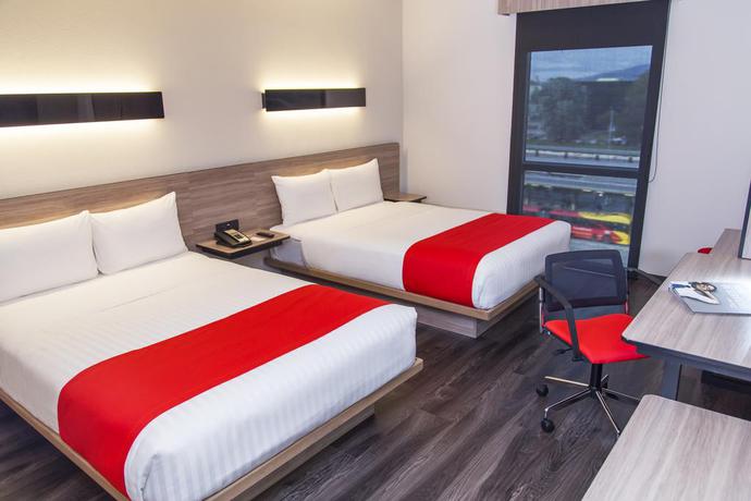 Imagen de la habitación del Hotel City Express Plus Bogota Aeropuerto. Foto 4