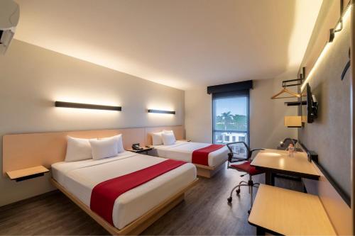 Imagen de la habitación del Hotel City Express Plus By Marriott Guadalajara Palomar. Foto 13