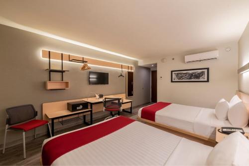 Imagen de la habitación del Hotel City Express Plus By Marriott Guadalajara Palomar. Foto 15