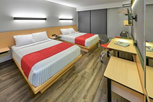 Imagen de la habitación del Hotel City Express Plus By Marriott Guadalajara Palomar. Foto 18