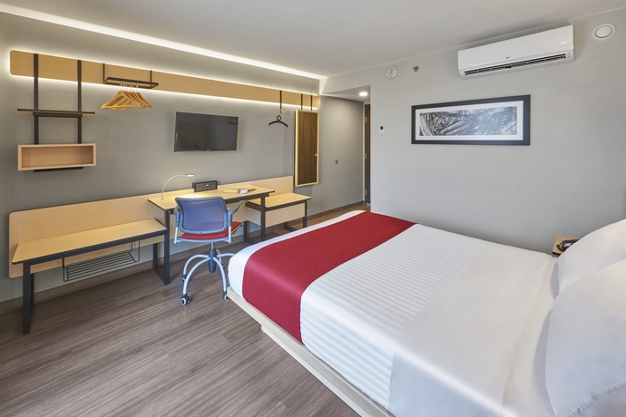 Imagen de la habitación del Hotel City Express Plus By Marriott Mundo E. Foto 6