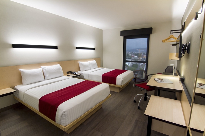 Imagen de la habitación del Hotel City Express Plus By Marriott Mundo E. Foto 10