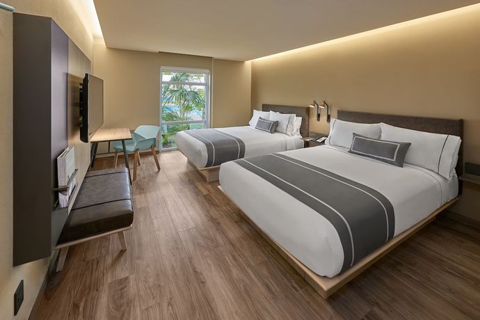 Imagen de la habitación del Hotel City Express Plus Cancun Aeropuerto Riviera. Foto 11