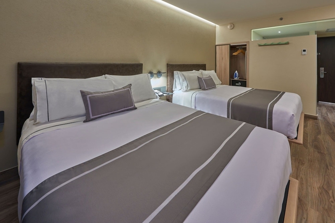 Imagen de la habitación del Hotel City Express Plus Mazatl&aacute;n. Foto 2