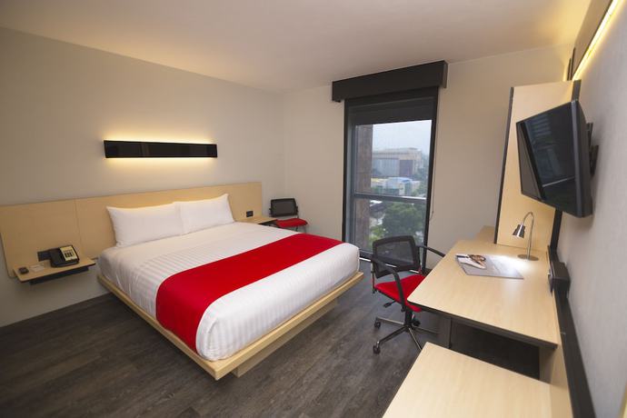 Imagen de la habitación del Hotel City Express Plus Medellin. Foto 5