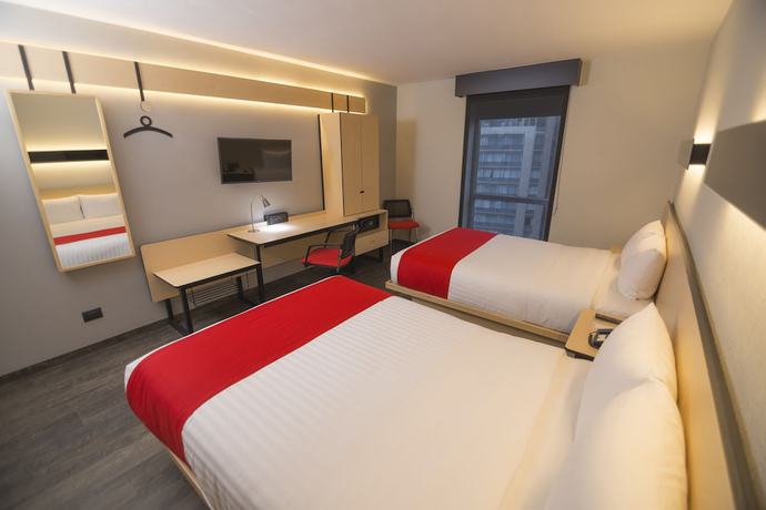 Imagen de la habitación del Hotel City Express Plus Medellin. Foto 9